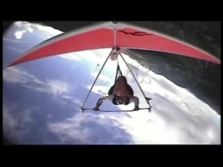 Andrea iemma with camera on board hang gliding aerobatics