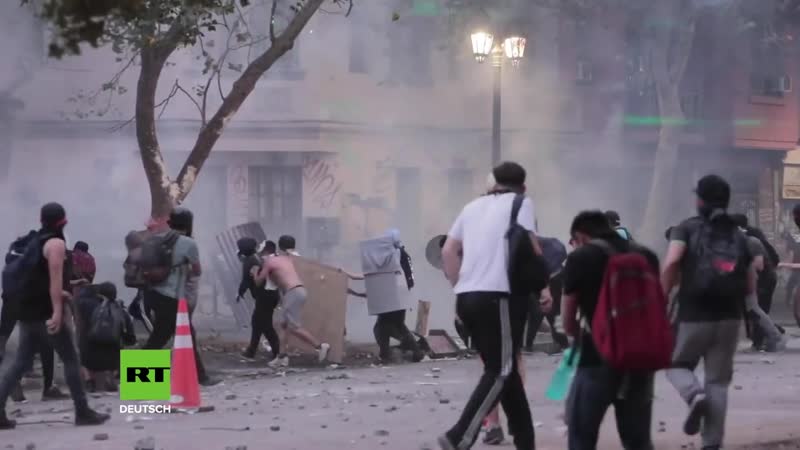 Chile zusammenstösse bei massenprotesten in santiago – universität in flammen