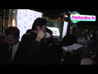 Chris evans greets fans while departing vanity fair young hollywood la (2014)