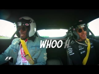 Usain bolt takes a hot lap around austin with lewis hamilton