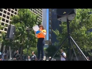 Alyssa milano activist is speaking at a protest in dallas against the nra convention