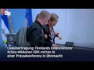 Liveübertragung finnlands innenminister krista mikkonen fällt mitten in einer pressekonferenz in ohnmacht