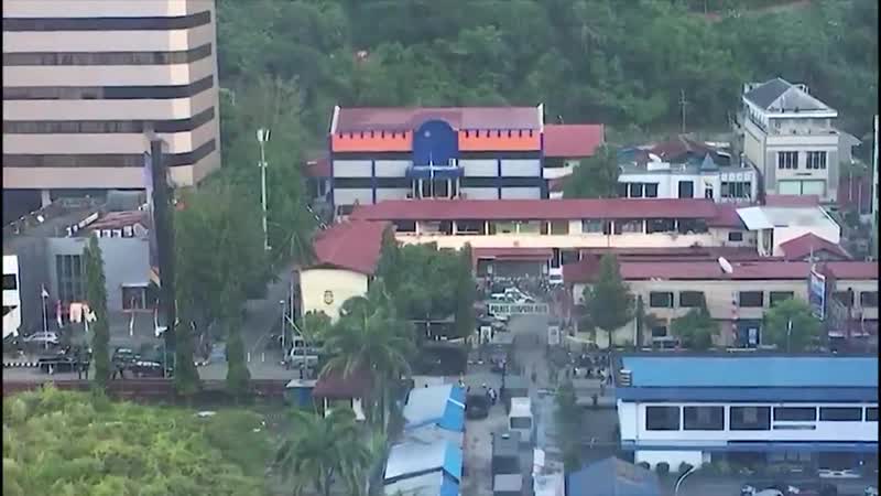 Video indonesias papua province has been plunged into chaos again as angry protesters torc