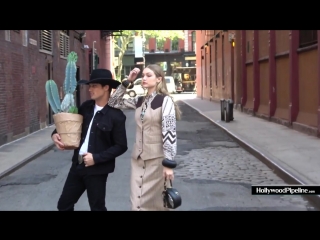 Gigi hadid and bull rider bonner bolton pose down in the middle of manhattan