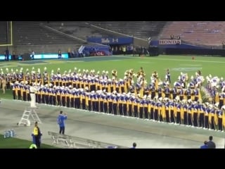 Ucla bruin marching band performing "pressure" by muse