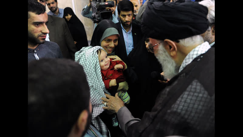 Ayatollah khamenei presented his keffiyeh to a disabled veteran's grandchild