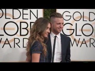 Ryan and genevieve tedder posing on the red carpet