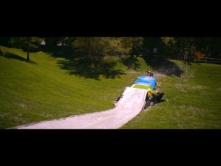 Slip n' slide launches people into kiddie pools