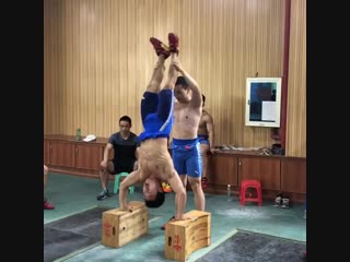 Deficit handstand push up performed by 61kg qin yanglin in wuhan training base great accessory exercise for the jerk and should