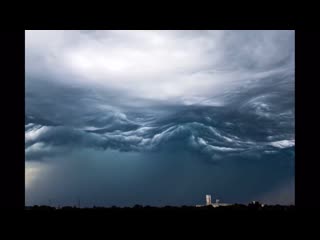 This a cloud formation called asperitas they form under unstable atmospheric conditions, and look like waves on a rough sea