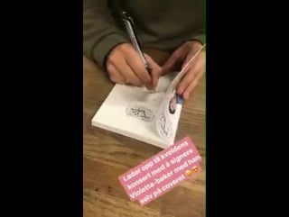 New video of jorge sighing his autograph in violetta books