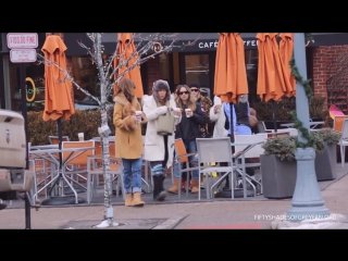 Dakota johnson posing with fans in aspen
