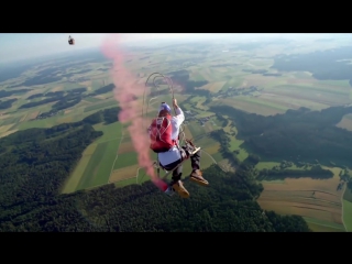 Skydivers play on the ultimate mega swing