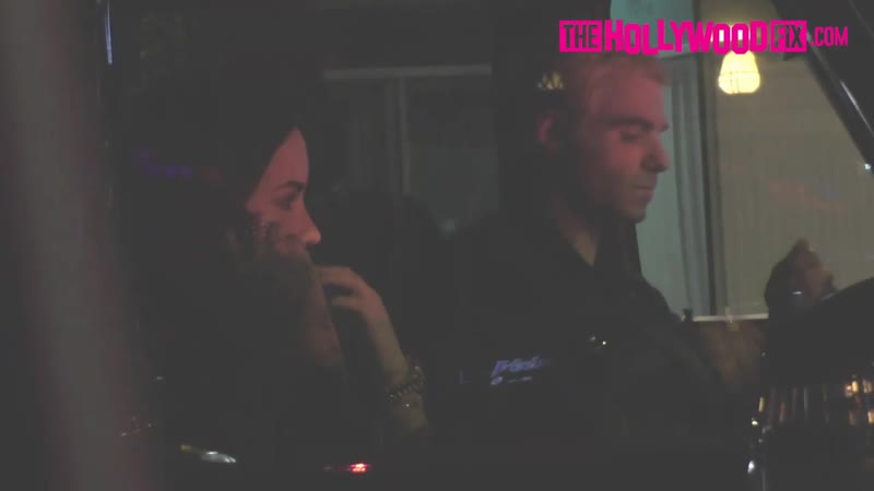 Demi lovato leaves a mansion party with mystery man in beverly hills while working on her sobriety