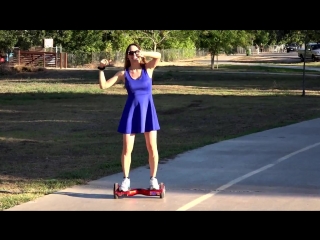 Катается sexy girl dancing on a smart balancing segway scooter