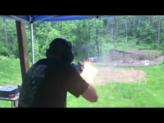 Ak 47 muzzle blast deflecting rain