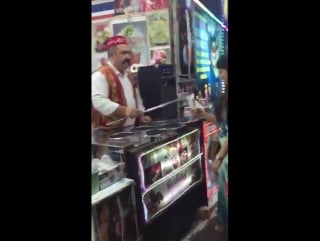 Turkish ice cream seller shows tricks under gerua