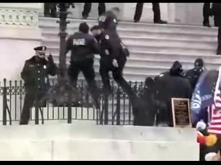 Jan / 6th / 2021 police officers retreat and rioters storm the capitol