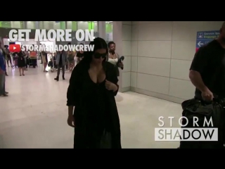 Exclusive pregnant kim kardashian is sexy and elegant in black as she arrives in paris