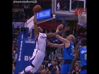 Caron butler dunks on chris kaman