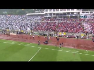 Guy in a literal hoverboard delivers the ball before a soccer match
