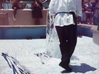 Ice carver sculpts an indian chief ice sculpture on the norwegian spirit cruise ship