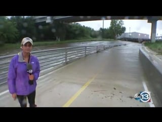 Abc13 pooja lodhia is at keegan's bayou in sw houston where water is flowing over the road