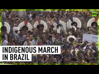 Indigenous protesters march on brazil congress