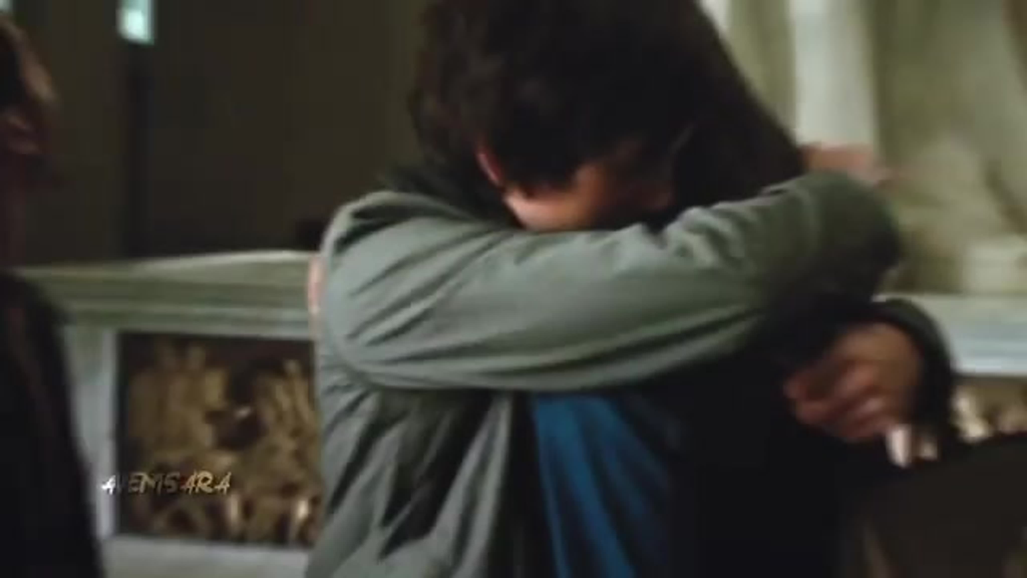 Her embrace tightening around him