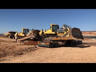 Transporting by side the huge komatsu d475 dozer 105 tonnes fasoulas h transports