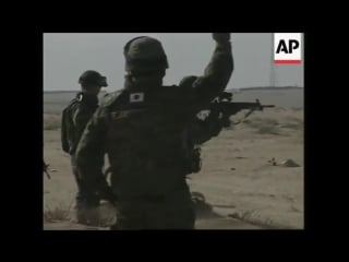 Japanese soldiers practice shooting ahead of iraq deployment