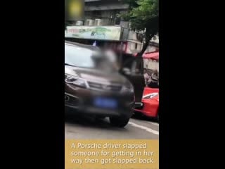 Police chiefs wife, who drives a porsche, slapping another driver