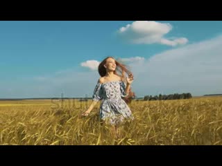 Stock footage pretty girl running through yellow wheat field happy beautiful young woman outdoors enjoying (1) webm