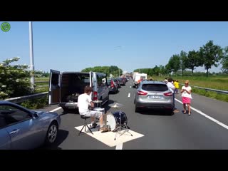 The moods drummer starts a traffic jam session