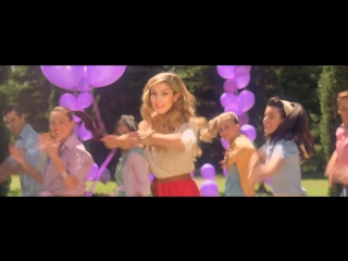 Delta goodrem sitting on top of the world