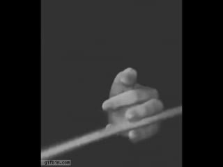 Slow motion drumstick spinning