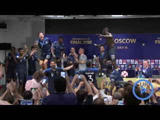 France players invade deschamps press conference and soak him in champagne