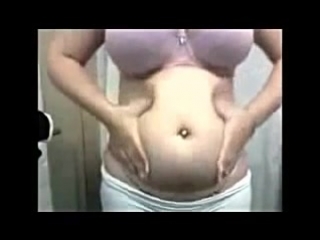 Chubby girl showing her stuff belly