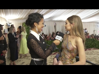 Gigi hadid on giving rihanna a love bite | met gala 2018 with liza koshy | vogue