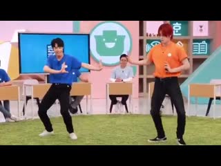 Doyoung and yuta dancing to cherry bomb, regular, and superhuman on 훈맨정음