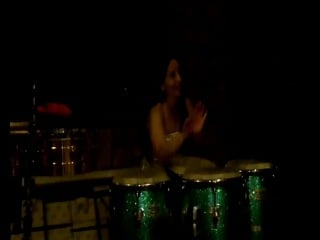 Woman in percussion melena rumbera new conga solo