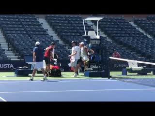 What happen ed happen ed rafa and roger greeting each other while changing practice shifts at uso19 in arthur ashe may