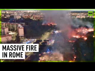 Huge blaze batters junkyard in rome