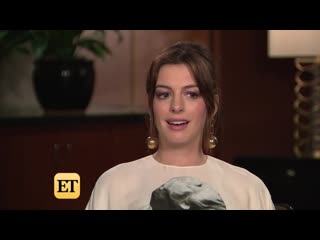 Pregnant anne hathaway looks divine in all white at modern love premiere