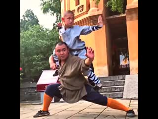 Shaolin master yan luo with his little disciple