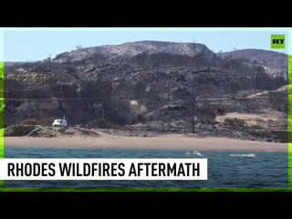 Rhodes ravaged by wildfires, hotels evacuated