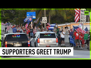 Hundreds of supporters greet trump's motorcade in west palm beach following court hearing