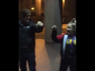 Norman doing "porras" with a cheerleader nola