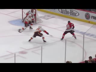 Patrick kane roofs backhander, acknowledges parents in crowd