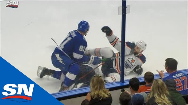 Zack kassian kicks erik cernak in chest after hit and pile up